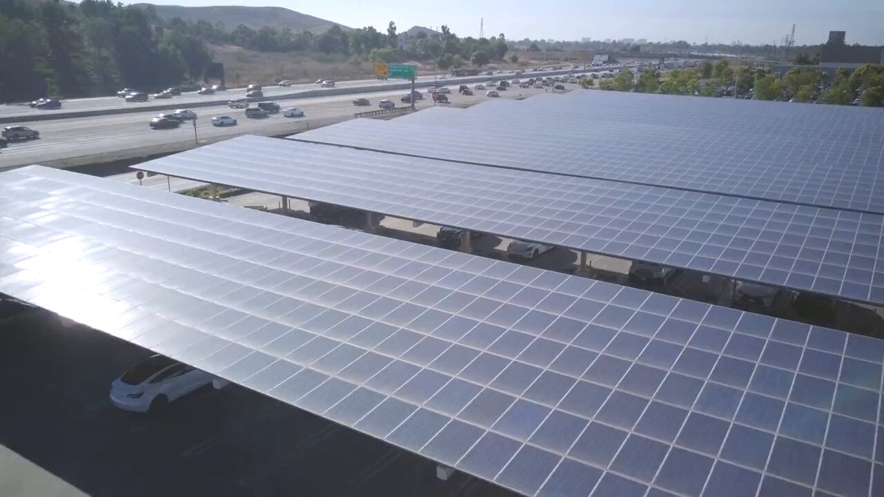 Aerial view of solar panel carports over a parking lot